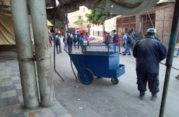 إشادة بعمال التنظيفات في مخيم خان الشيح