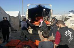 توزيع مادة الفحم في مخيمي دير بلوط والمحمدية