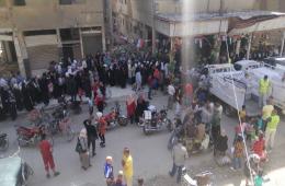 المؤتمر الشعبي لفلسطينيي الخارج يوزع مساعدات إغاثية في مخيم اليرموك