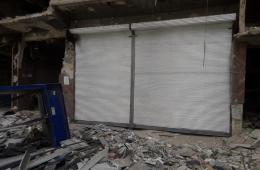 ترميم أكثر من 20 محل تجاري في مخيم اليرموك 