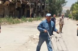 حقوقيون: عودة النازحين إلى مخيم اليرموك يساهم في تخديمه