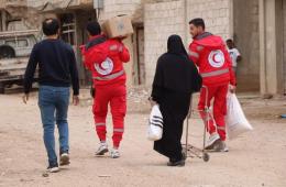 توزيع مساعدات إغاثية على أهالي مخيم درعا