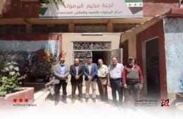 وفد من مجموعة العمل يزور لجنة مخيم اليرموك للتنمية المجتمعية