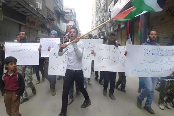 The Residents of the Besieged Yarmouk Camp Demonstrate to Demand the Release of the Detainees in the Syrian Prisons.
