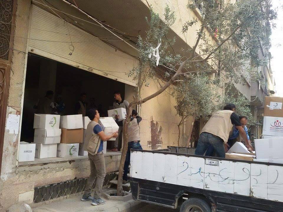 Relief Agencies Distribute Food Aid to the People of Yarmouk in Yalda