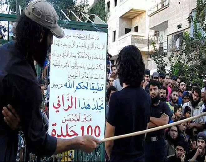 ISIS lash a Young Man with 100 Lashes in Charges of Adultery in Yarmouk