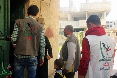 Palestine Charity pays relief visit to Yarmouk displaced civilians sheltered in Yalda
