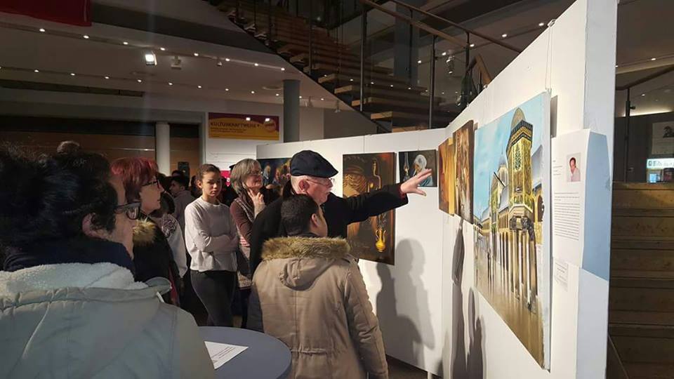 Palestinian Refugee Formerly Shelter in Khan Al-Sheih Camp Holds Art Exhibition in Germany