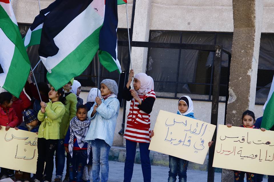 Palestinian children organize a solidarity stand in the south of Damascus, in the support of Jerusalem