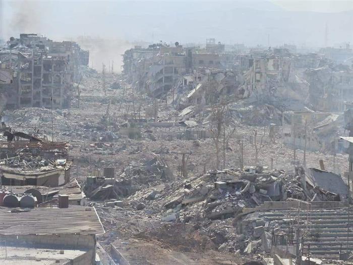 After 33 days of its bombardment, the Syrian regime controls Yarmouk camp and 3 bodies are removed from under the rubble