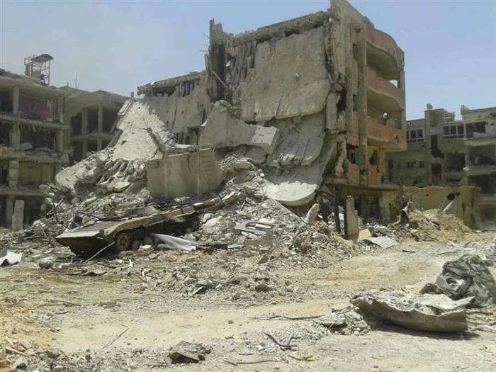 Calls for the exhumation of the bodies of Palestinian families still buried under the rubble in Yarmouk camp