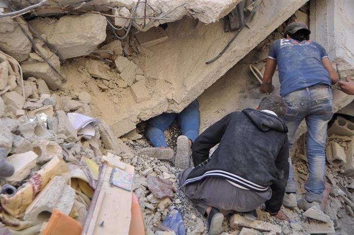 Renewed appeals for the exhumation of Palestinian families still under rubble in Yarmouk camp