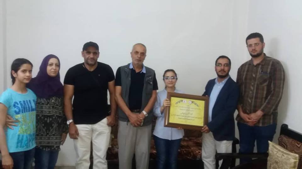 The Charitable Association and the Palestine Student Association honor the two outstanding Palestinian students in the basic education certificate in Syria