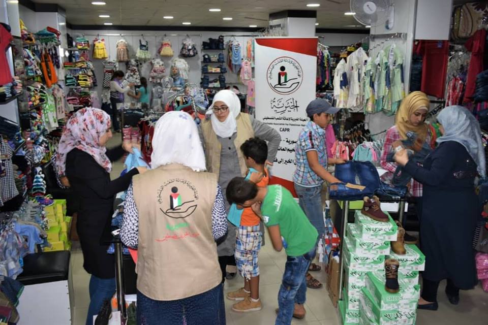 Palestine Charity Distributes Aids to Palestinians from Syria