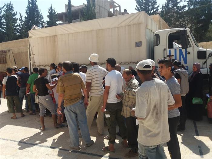 In-Kind Aid Items Handed over to Displaced Palestinian Families South of Damascus