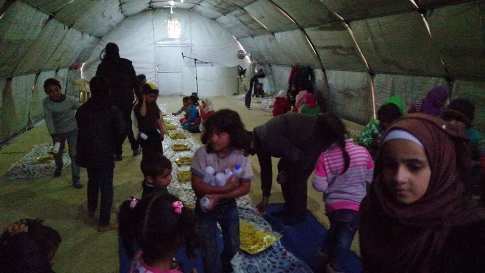 Luncheon Held by Charity in Deir Ballout Camp
