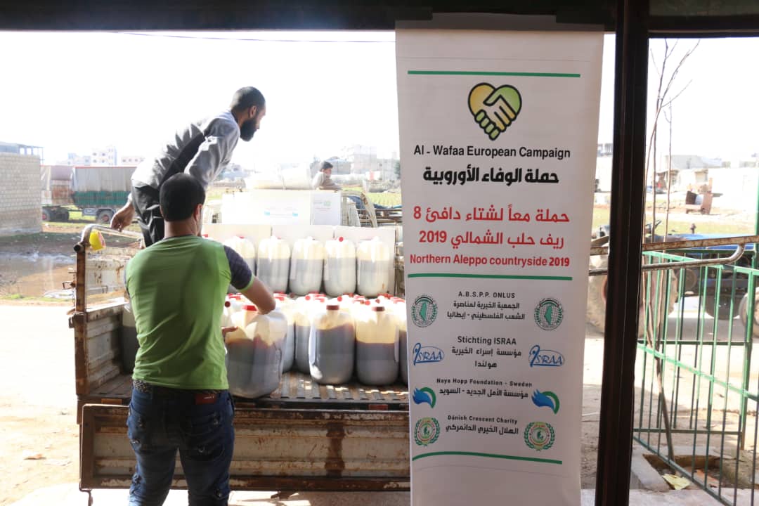 Relief Aids, Heating Kit Handed Over to Displaced Families North of Syria