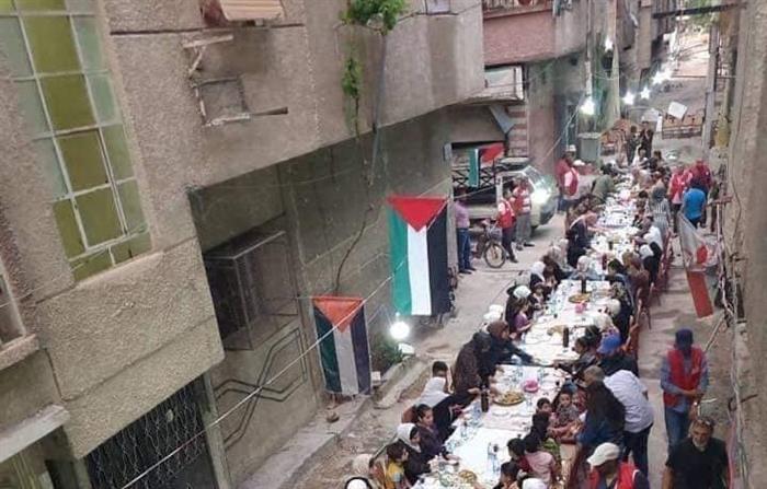 Heavy Criticism Leveled at PLO over Fast-Breaking Banquet in Embattled Yarmouk Camp for Palestinian Refugees