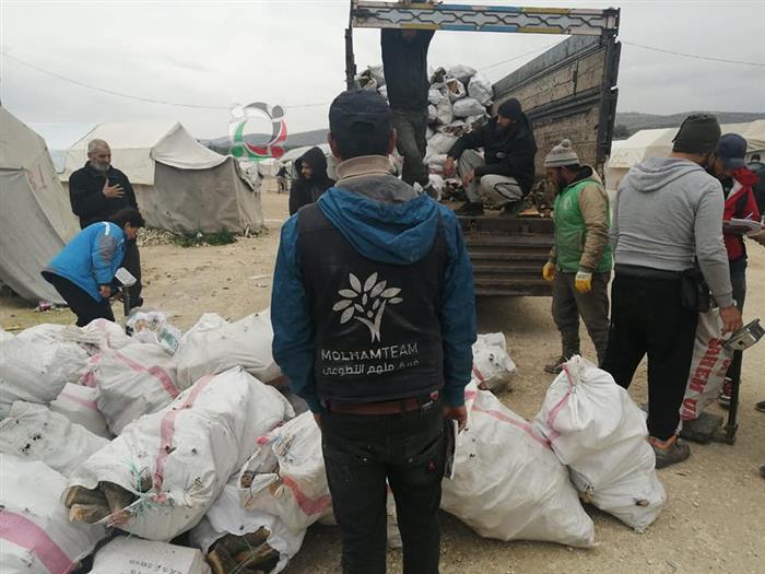 Wood Bundles Distributed in Refugee Camps North of Syria