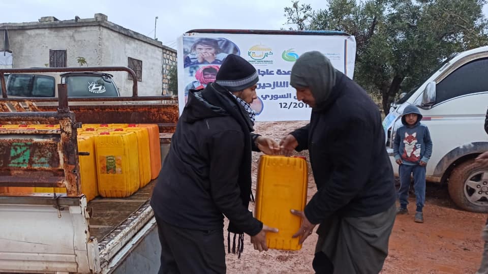 Relief Aids Handed Over to Displaced Palestinian Families North of Syria