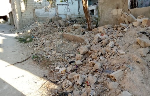 Palestinian Refugees in Syria Displacement Camp Appeal for Debris Clearance