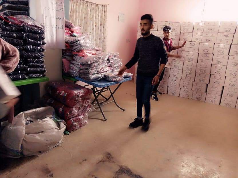 Red Crescent Distributes Relief Items in Hindarat Camp for Palestinian Refugees 