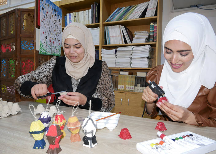 2 Palestinian Refugee Women Manage Recycling Workshop