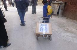 Food Aid Distribution Continues for the third Day Respectively in the Besieged Yarmouk Camp.