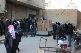 Aid distribution to displaced people of Yarmouk camp.