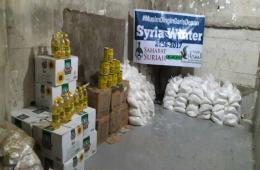 Palestine Charity Commission distributes food aids in southern Syria