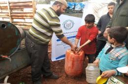 Islamic Organization for Relief of Orphans Distributes Aids to Palestinians in Idlib, Southern Turkey