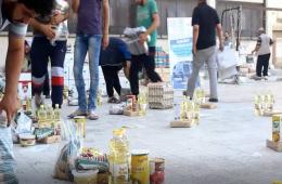 450 Food Baskets Handed Over to Palestinian Families South of Damascus