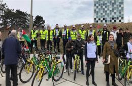 Palestinians of Syria participate in a bicycles marathon in the Hague