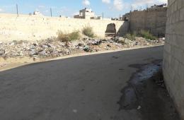 Trash Mounds Piled Up in AlHusaniya Camp